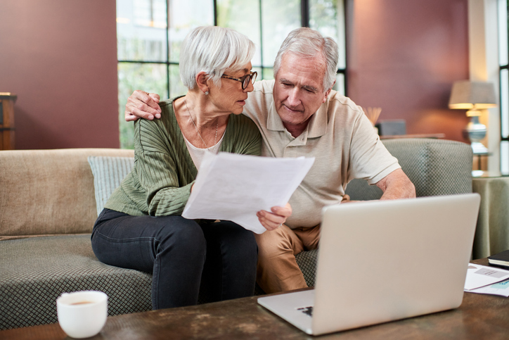 A retiree reviews tax-saving strategies like Roth conversions and withdrawal timing to help reduce long-term tax costs.